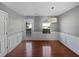 Bright dining room with hardwood floors and wainscoting at 2891 Vining Ridge Ter, Decatur, GA 30034