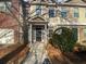 Townhome exterior with a dark door and walkway at 2891 Vining Ridge Ter, Decatur, GA 30034