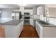 Modern kitchen with stainless steel appliances and gray countertops at 2891 Vining Ridge Ter, Decatur, GA 30034
