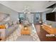 Virtually staged living room with hardwood floors and neutral decor at 2891 Vining Ridge Ter, Decatur, GA 30034