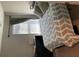 Cozy bedroom with green bedding and window coverings at 2786 Laurel Ridge Cir, East Point, GA 30344