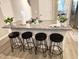 Kitchen island with seating for four and granite countertop at 2786 Laurel Ridge Cir, East Point, GA 30344