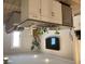 Modern kitchen with island and flat screen TV at 2786 Laurel Ridge Cir, East Point, GA 30344