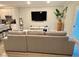 Living area with large sectional sofa and mounted TV at 2786 Laurel Ridge Cir, East Point, GA 30344