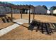 Wooden pergola with paved patio in community space at 2786 Laurel Ridge Cir, East Point, GA 30344