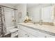 Main bathroom with granite countertop, bathtub, and shower at 643 Cygnet Ln, Grayson, GA 30017