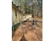 Mobile home with small deck and fenced backyard at 4197 Hwy 162, Covington, GA 30016