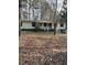 Single-wide mobile home with front porch and large yard at 4197 Hwy 162, Covington, GA 30016