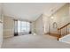 Bright living room with hardwood floors and a view of the front entrance at 1001 Heatherwood Ct, Norcross, GA 30093