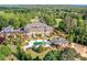 Breathtaking aerial view of the grand estate with pool and lush landscaping at 5200 Moore Rd, Suwanee, GA 30024