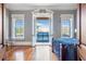 Bright bedroom with access to a private balcony offering scenic views and natural light at 5200 Moore Rd, Suwanee, GA 30024