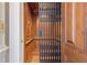 A private elevator with wood paneling and classic design offers convenience and luxury within the home at 5200 Moore Rd, Suwanee, GA 30024