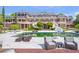 Stunning home with an oversized pool, patio, and immaculately landscaped yard at 5200 Moore Rd, Suwanee, GA 30024