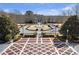 Aerial view of the circle driveway with a fountain in the middle in the front yard at 5200 Moore Rd, Suwanee, GA 30024