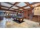 Entertainment room with a pool table, bar, and comfortable seating perfect for gatherings at 5200 Moore Rd, Suwanee, GA 30024