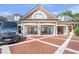 Spacious garage with multiple bays and a stylish brick driveway at 5200 Moore Rd, Suwanee, GA 30024