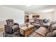Open concept living room featuring a TV and a view of eat-in kitchen at 7247 Emma Ct, Douglasville, GA 30134
