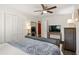 Bright bedroom featuring a large bed and TV at 2479 Cedar Canyon Se Rd # 2479, Marietta, GA 30067