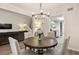 Open dining area with chandelier and kitchen access at 2479 Cedar Canyon Se Rd # 2479, Marietta, GA 30067