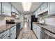 Updated kitchen with light cabinets, granite counters and stainless steel appliances at 2479 Cedar Canyon Se Rd # 2479, Marietta, GA 30067