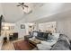 Living room with sectional sofa, hardwood floors, and high ceilings at 2479 Cedar Canyon Se Rd # 2479, Marietta, GA 30067
