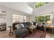 Open concept living room with sectional sofa and access to backyard at 2479 Cedar Canyon Se Rd # 2479, Marietta, GA 30067
