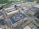 Aerial view of a mixed-use development with multiple buildings and ample parking at 260 18Th Nw St # 10226, Atlanta, GA 30363
