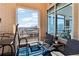 Private balcony with city views, patio furniture, and blue rug at 260 18Th Nw St # 10226, Atlanta, GA 30363