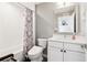 Clean bathroom with white vanity, hexagon floor tile, and bathtub at 260 18Th Nw St # 10226, Atlanta, GA 30363