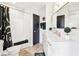 Modern bathroom with white tile, quartz vanity, and updated fixtures at 260 18Th Nw St # 10226, Atlanta, GA 30363
