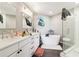Spa-like bathroom with double vanity, soaking tub, and walk-in shower at 260 18Th Nw St # 10226, Atlanta, GA 30363