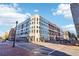 Modern building exterior with street-level retail and corner view at 260 18Th Nw St # 10226, Atlanta, GA 30363