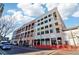 Building exterior with street-level retail and visible parking at 260 18Th Nw St # 10226, Atlanta, GA 30363