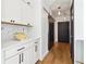 Modern entryway with white shaker cabinets and a barn door at 260 18Th Nw St # 10226, Atlanta, GA 30363