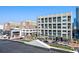 Modern building exterior with retail spaces on the ground floor and residential units above at 260 18Th Nw St # 10226, Atlanta, GA 30363