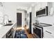 Modern kitchen with white cabinets and stainless steel appliances at 260 18Th Nw St # 10226, Atlanta, GA 30363