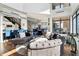 Sunlit living area featuring a large sectional sofa and city views at 260 18Th Nw St # 10226, Atlanta, GA 30363