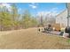 Expansive backyard with patio and wooded views, perfect for outdoor entertaining at 5010 Ethans Cove Dr, Austell, GA 30106