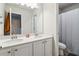 Clean bathroom with double vanity and shower at 5010 Ethans Cove Dr, Austell, GA 30106