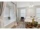 Spa-like bathroom with double vanity and garden tub at 5010 Ethans Cove Dr, Austell, GA 30106