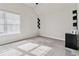 Spacious bedroom with window and wall shelving at 5010 Ethans Cove Dr, Austell, GA 30106