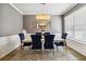 Elegant dining room with a modern table and chairs at 5010 Ethans Cove Dr, Austell, GA 30106
