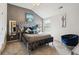 Main bedroom with plush bed and accent wall at 5010 Ethans Cove Dr, Austell, GA 30106