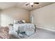 Main bedroom with king bed and sitting area at 5010 Ethans Cove Dr, Austell, GA 30106