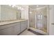 Bathroom with granite countertop, double vanity and shower at 3075 Westpoint Cir, Snellville, GA 30078