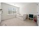 Cozy bedroom with a day bed, built in drawers, and bookshelves at 3075 Westpoint Cir, Snellville, GA 30078