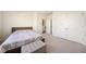 Bright bedroom with carpeted floor and double door closet at 3075 Westpoint Cir, Snellville, GA 30078