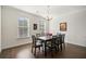 Bright dining room with hardwood floors and a chandelier at 3075 Westpoint Cir, Snellville, GA 30078