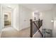 Upstairs hall with carpet flooring, a full bathroom, and linen closet at 3075 Westpoint Cir, Snellville, GA 30078
