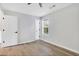 Spacious bedroom with hardwood floors, ceiling fan and ample closet space at 6231 Creekford Dr, Lithonia, GA 30058